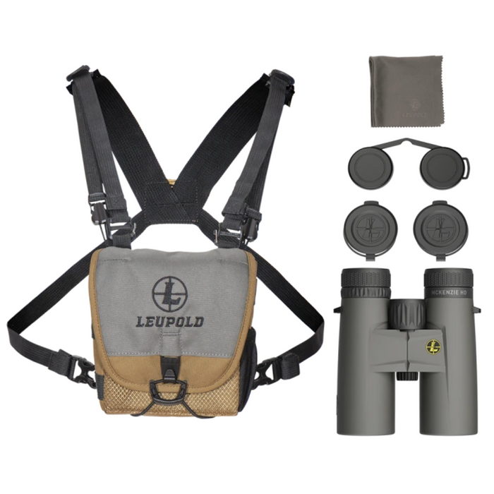 gray and black binoculars with harnass case lens caps and cloth