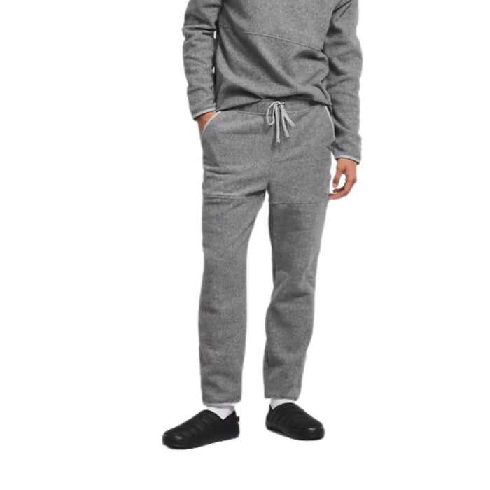 North Face Men’s Alpine Polartec® 100 gray Pants and top worn by model with black shoes 
