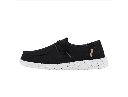 HeyDude Women's Wendy Black Odyssey shoe with white sole with black specks