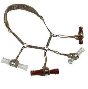 Camouflage lanyard with three o rings attaching four whistles