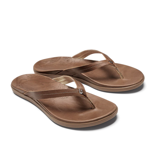Olukai Women's Honu Wrapped in full-grain leather and laser-etched, this sandal embodies the beauty of the Honu (Hawaiian Green Sea Turtle). brown