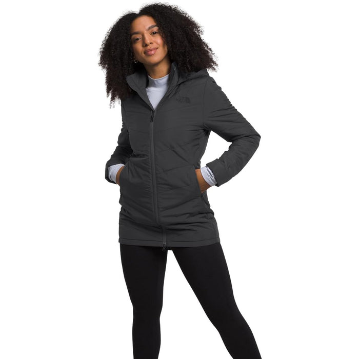 model wearing North Face Women's Tamburello Insulated full zip gray Parka over a light gray top and black pants