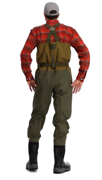 model wearinhg tricolor bib wader with black rubber boots red flannel shirt and gray hat