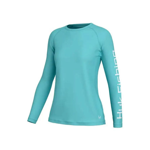 aqua with HUK fishing on arm in whiteHuk Women's Pursuit Long Sleeve 