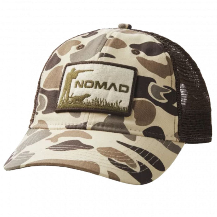 Nomad Wing Shooter Cap in old school camo featuring logo patch with hunter and dog