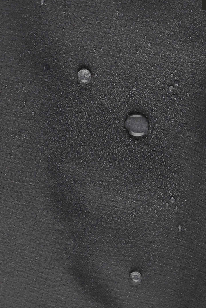 gray material demonstrating water repellent capabilities